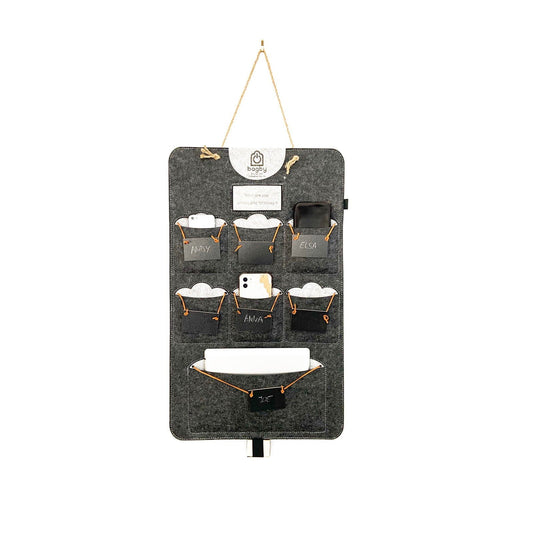 Dark charcoal Bagby FAMILY organizer with six named phone pockets and a lower pocket holding a white tablet.