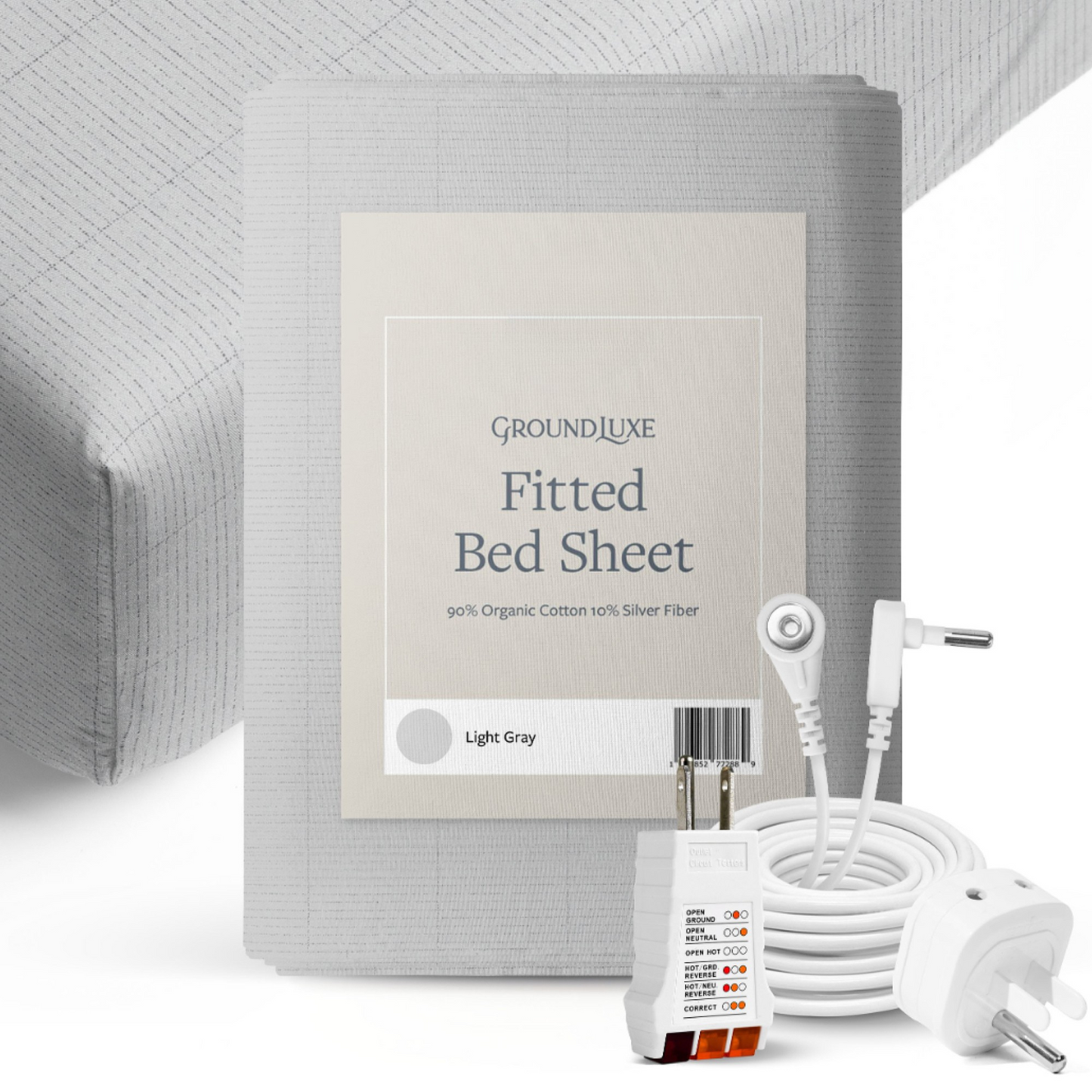 GroundLuxe Fitted Bed Sheet in Light Gray displayed with packaging, grounding cord, and connection device on white background.