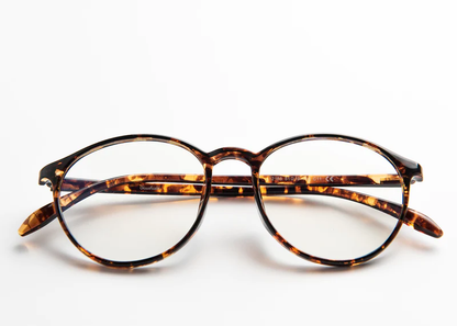 Ocushield Clear All-Day Blue Light Glasses in tortoiseshell frame, front view on white background.