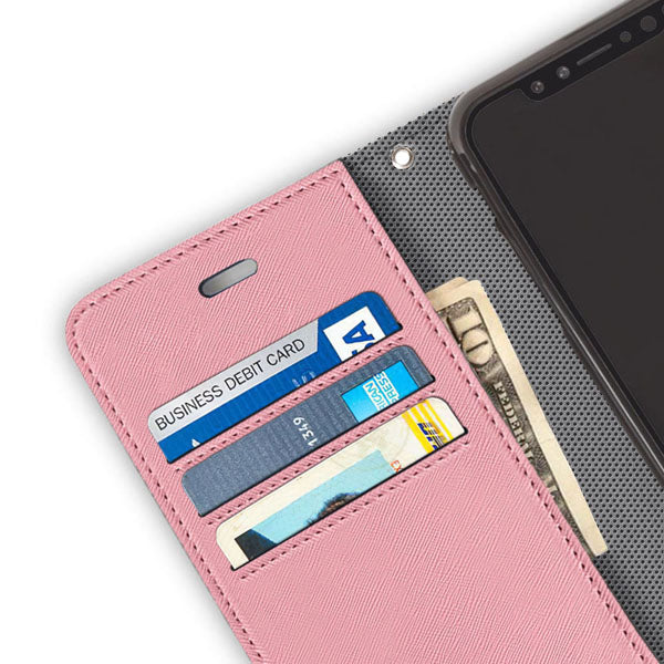Pink SafeSleeve iPhone case with open wallet flap displaying multiple card slots containing credit cards and cash, shown next to smartphone.