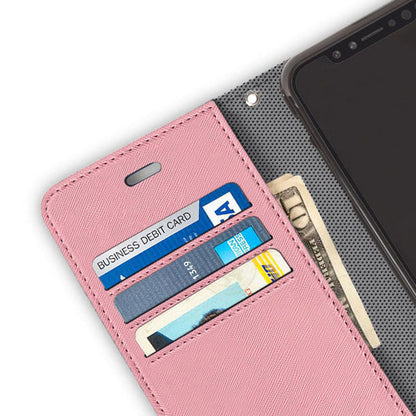 Pink SafeSleeve iPhone case with open wallet flap displaying multiple card slots containing credit cards and cash, shown next to smartphone.