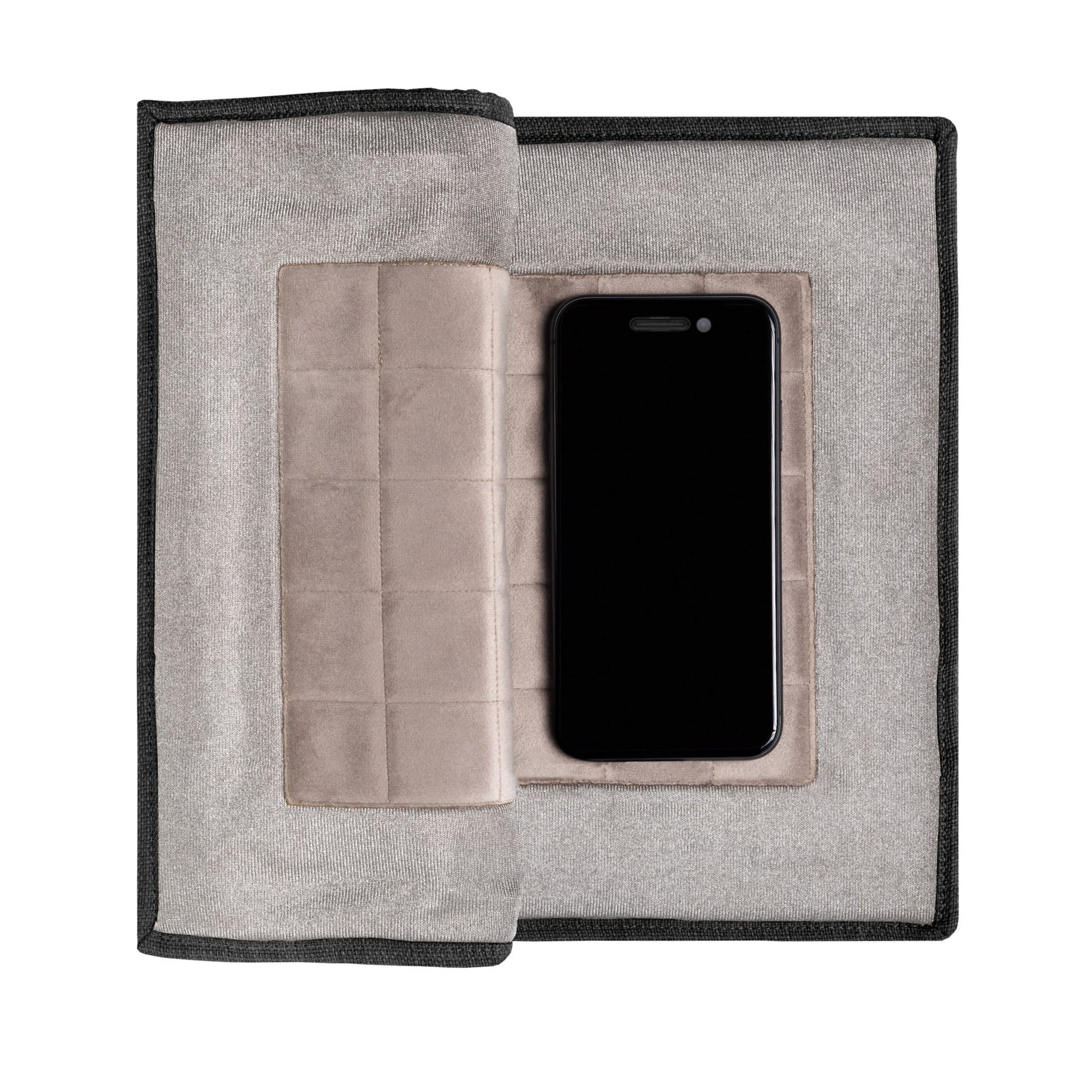 PoM Shield ORIGINAL Faraday cage open with smartphone inside protective pouch, top view.