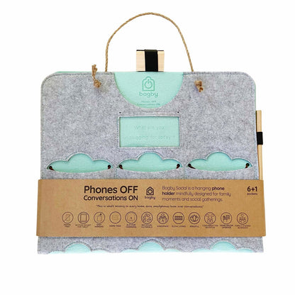 Light gray Bagby FAMILY organizer with mint-green pocket accents, rope hanger and wooden chalk pencil, in its kraft band.