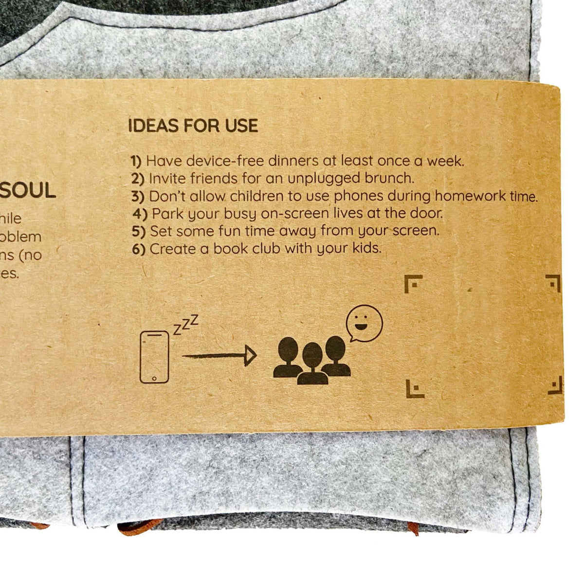 Close-up of the Bagby FAMILY packaging band listing ideas for device-free family time, with a phone-to-people icon.