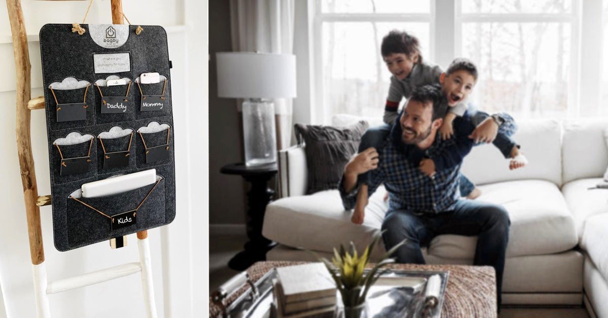 Dark gray Bagby FAMILY organizer hanging on a wooden ladder with tags for Daddy, Mommy and Kids, beside a father playing with two boys.