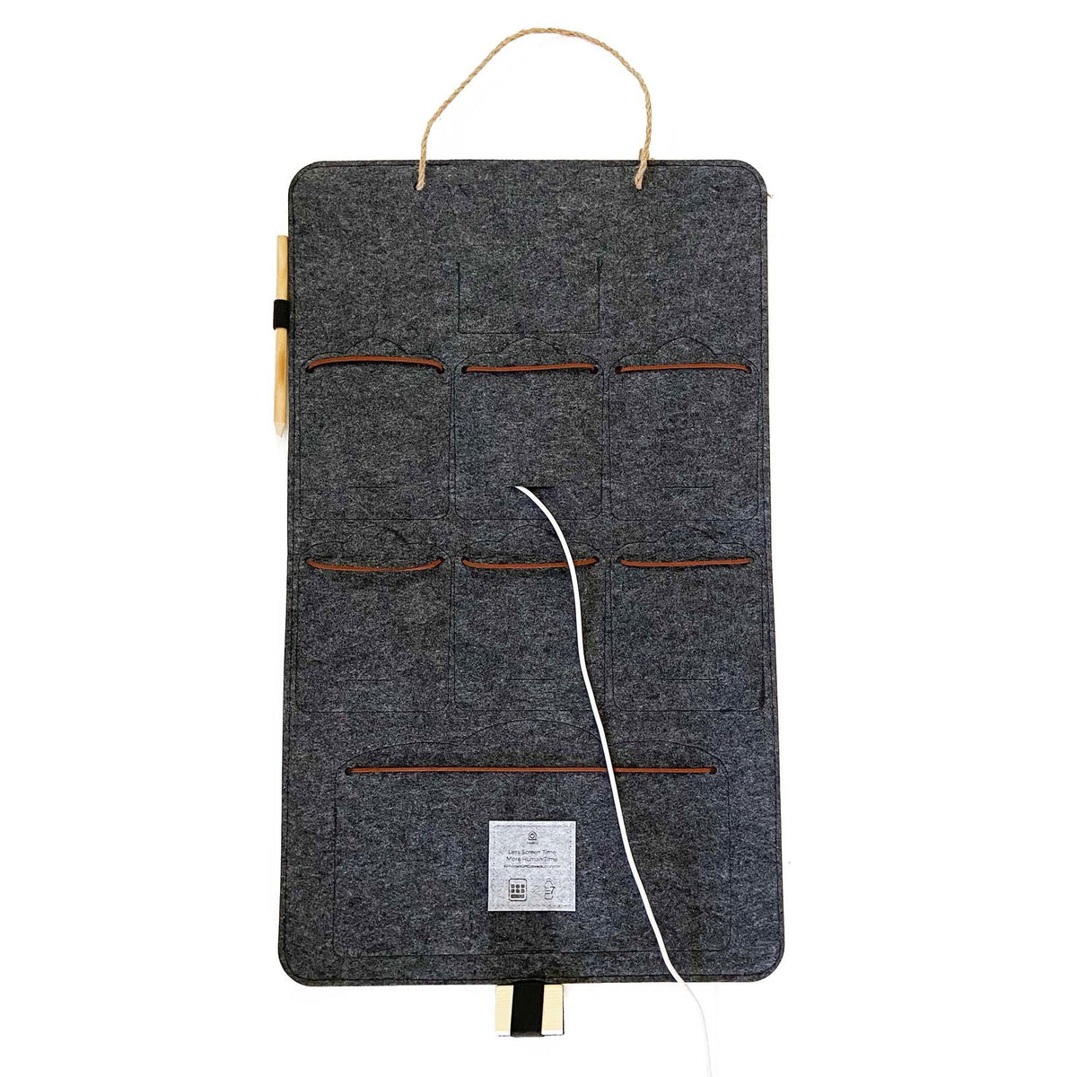 Interior view of a dark charcoal Bagby FAMILY organizer with orange cord ties and a white charging cable threaded through the base.