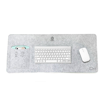 Bagby MAT desk pad in Gray/Mint with a white wireless keyboard and mouse, and a phone in the mint-lined pocket.