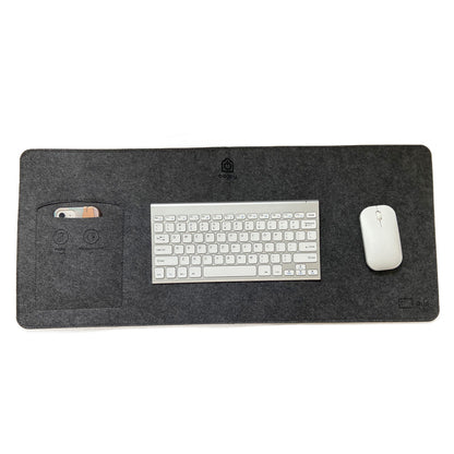 Bagby MAT desk pad in Charcoal/Charcoal with a white wireless keyboard and mouse, and a phone in the side pocket.