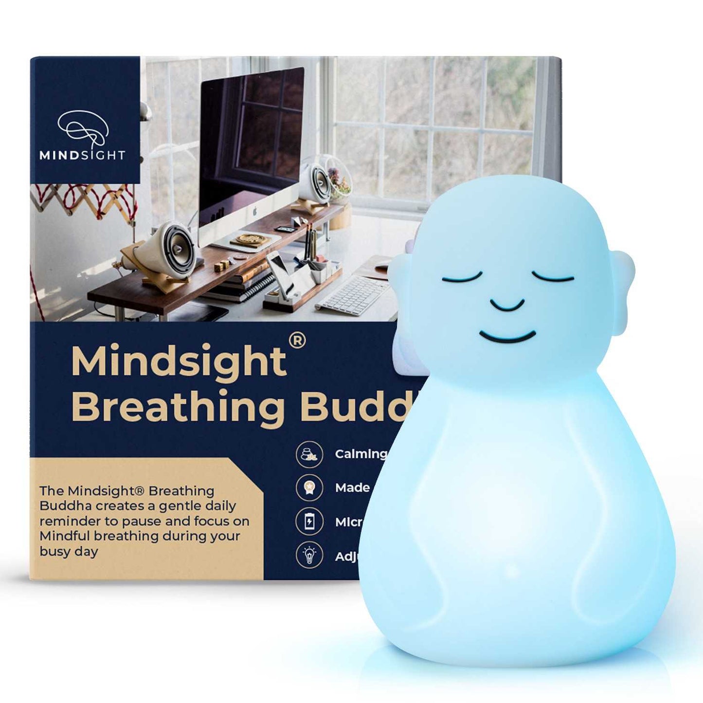 Mindsight Breathing Buddha light-blue meditation device with closed eyes beside its retail packaging box.