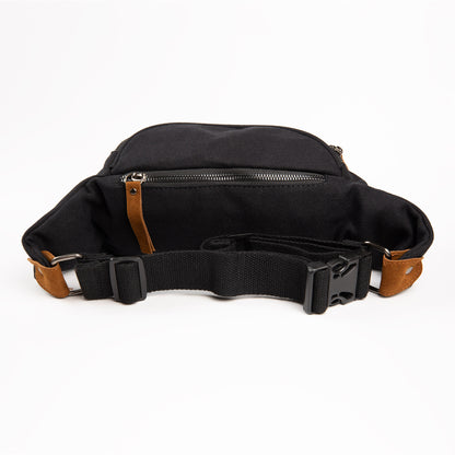 SYB Cross Body Fanny Pack Canvas Traveler open interior view showing black canvas lining and zipper pocket with brown leather accents.
