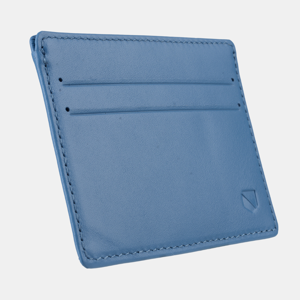 Blue leather SLNT RFID Wallet with card slots and stitched edges, angled view showing minimalist design and brand logo.