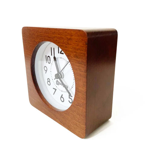 Wooden square bedside clock with white face and Arabic numerals from the Bagby Better Bedroom Bundle.