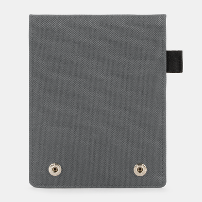Gray Faraday Key Fob Bag with black fabric tab and two silver snap buttons on front, displayed flat against white background.