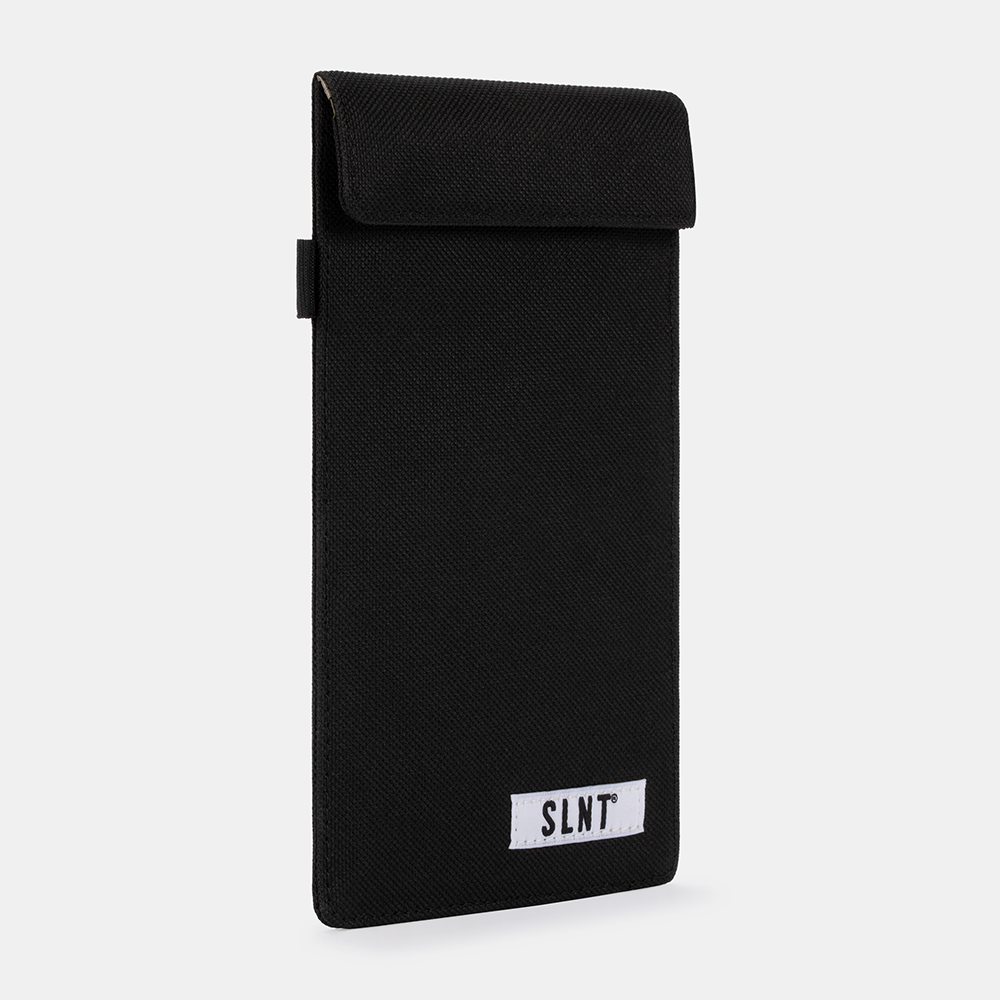 Black Faraday Key Fob Bag with fold-over flap closure and SLNT branding label, displayed at an angle.