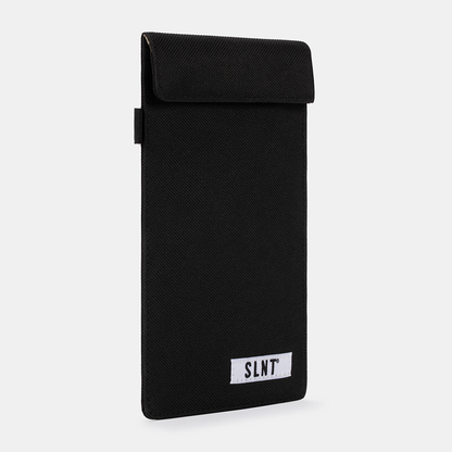 Black Faraday Key Fob Bag with fold-over flap closure and SLNT branding label, displayed at an angle.