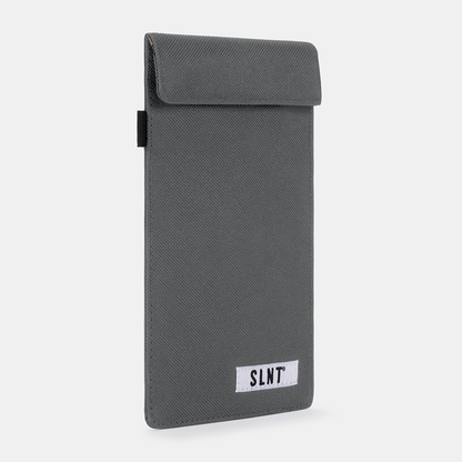 Gray Faraday Key Fob Bag with SLNT label, front view showing flap closure and black side strap against white background.