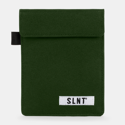 Green canvas Faraday Key Fob Bag with black pull tab and white SLNT brand label on front.