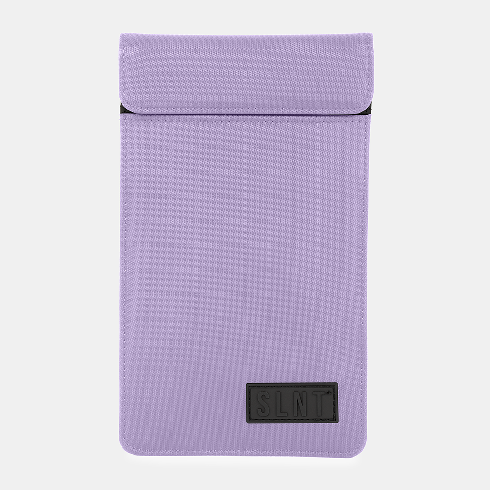 Purple SLNT Faraday Phone Sleeve with black logo label, front view against neutral background.