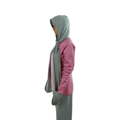 Side view of woman wearing LessEMF Hooded Scarf with Pockets in sage green and mauve, showing hood and draped scarf detail.