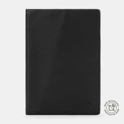 Black leather SLNT RFID Passport Wallet front view with RFID blocking logo in bottom right corner against light gray background.