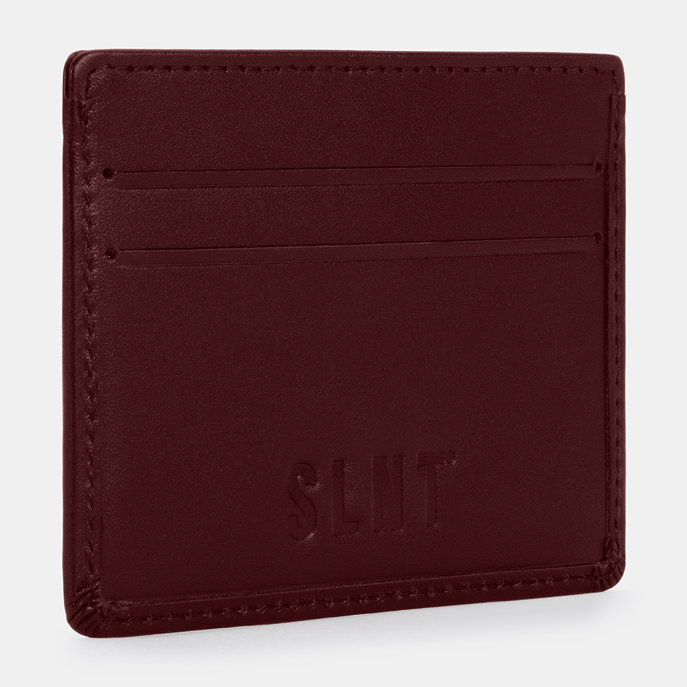 Burgundy SLNT RFID Wallet displayed at an angle, showing the front with embossed logo and horizontal card slot lines.