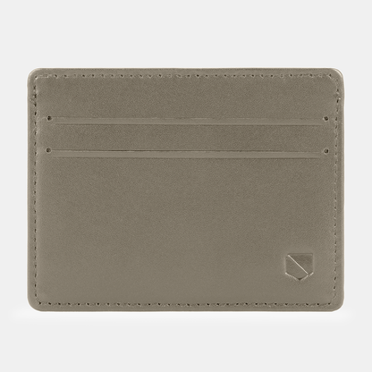 SLNT RFID Wallet in sage green leather, front view showing multiple card slots and brand logo embossed in corner.