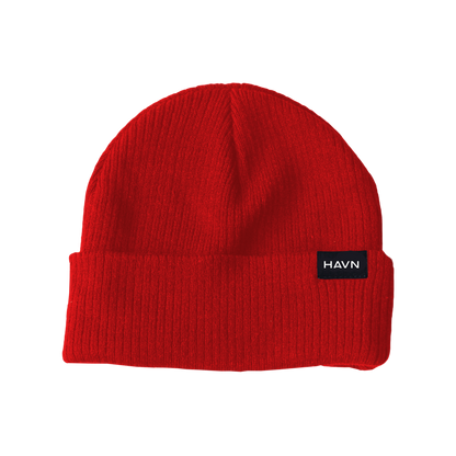 Red ribbed HAVN WaveStopper™ Beanie with black logo label on front, displayed on white background.