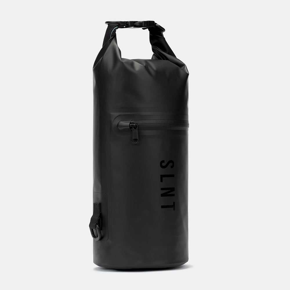 Black SLNT Faraday Dry Bag with roll-top closure, front zipper pocket, and shoulder carabiners against white background.