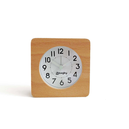 Beech wood Bagby FARMHOUSE alarm clock with a white analog dial, black numbers and the Bagby logo, shown at an angle on white.