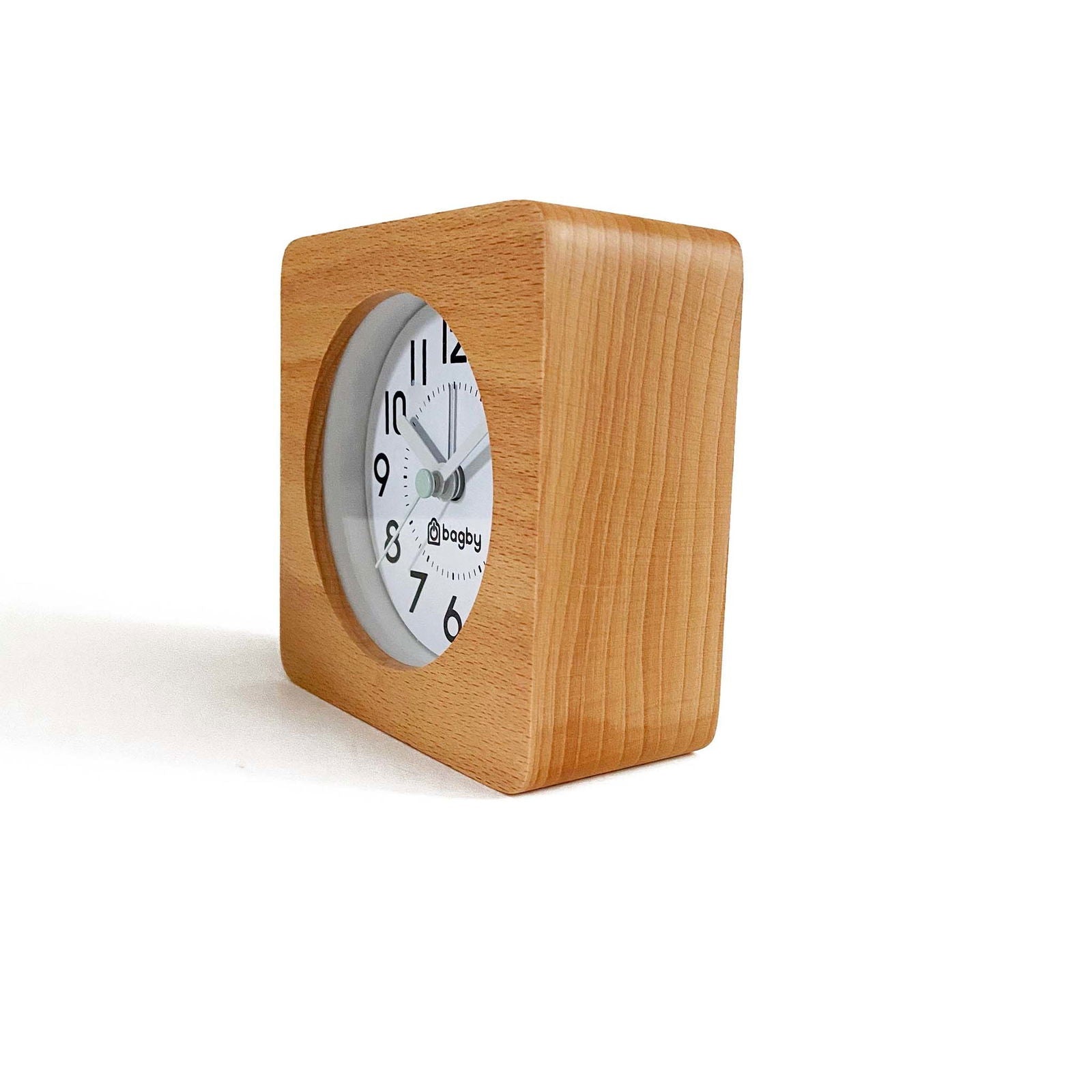 Side view of the beech wood Bagby FARMHOUSE alarm clock showing its square wooden body and white analog dial.