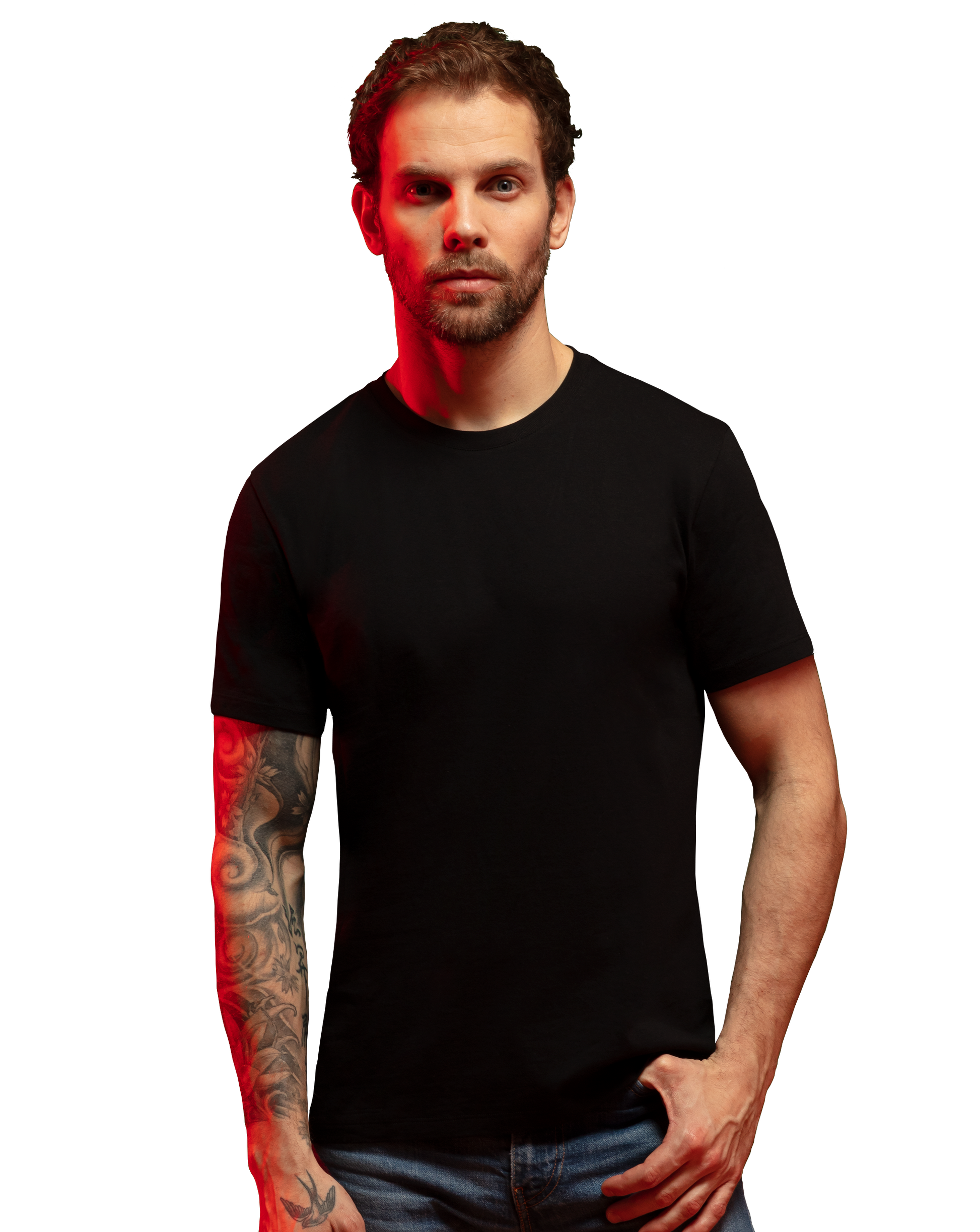 Man wearing black HAVN WaveStopper™ T-Shirt 2.0 with jeans, red lighting effect, front view.
