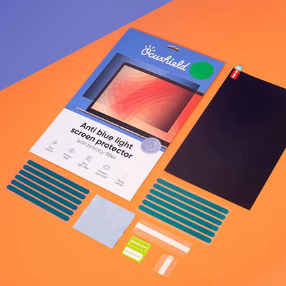 Ocushield anti-blue light screen protector packaging displayed with protective strips and microfiber cloth on orange background.