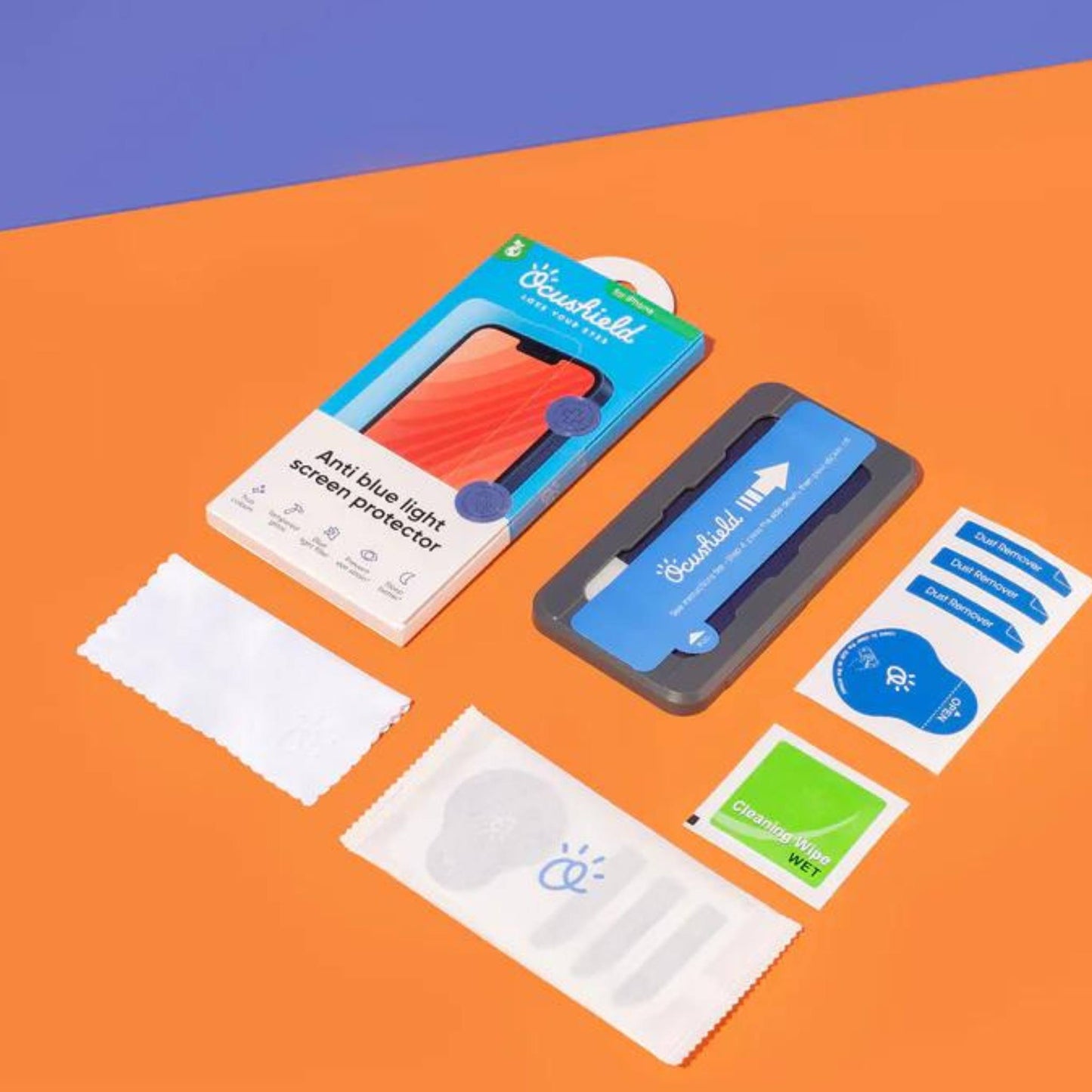 Ocushield Blue Light Screen Protector packaging and contents displayed flat, including protective film, application tools, and cleaning wipes on orange background.