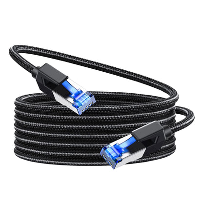 Black braided Ethernet cable with blue connectors coiled on white background.