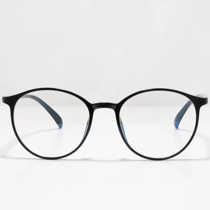 Ocushield Clear All-Day Blue Light Glasses in black with round frames and blue-tinted temples, front view on white background.