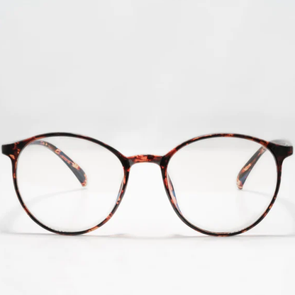 Ocushield Clear All-Day Blue Light Glasses in tortoiseshell pattern, front view against white background.