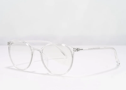 Clear frame Ocushield All-Day Blue Light Glasses displayed at angle on white background, showing side profile view of the transparent acetate frame design.