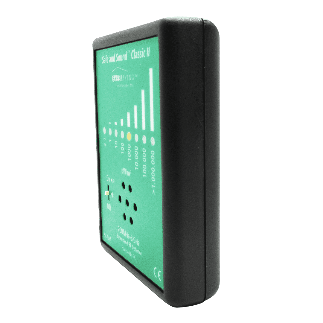 Safe and Sound Classic II electromagnetic field detector with green display showing signal strength bars and numerical readings, side angle view.