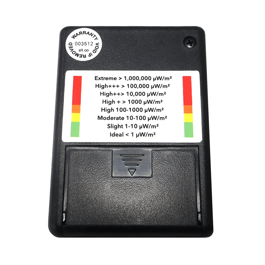 SLT Safe and Sound Classic III electromagnetic field detector showing color-coded radiation level scale from ideal to extreme exposure ranges.
