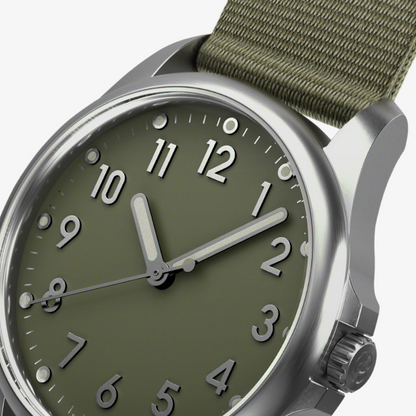 Mudita Radiant Moss Green automatic field watch - dial closeup