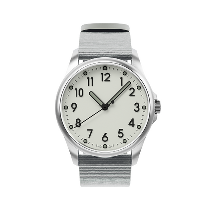 Mudita Radiant Pebble Gray automatic field watch - three-quarter view