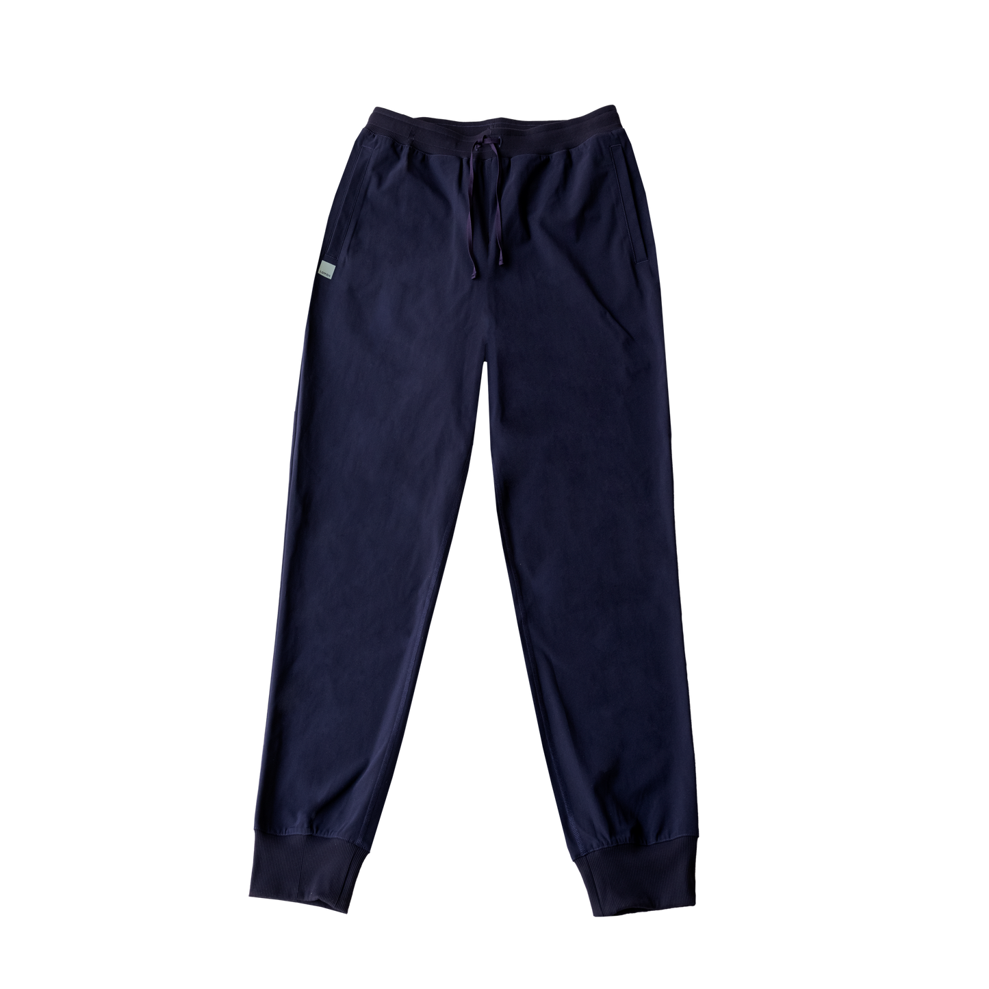 Navy HAVN WaveStopper™ Joggers with drawstring waist and ribbed cuffs, flat lay view on white background.