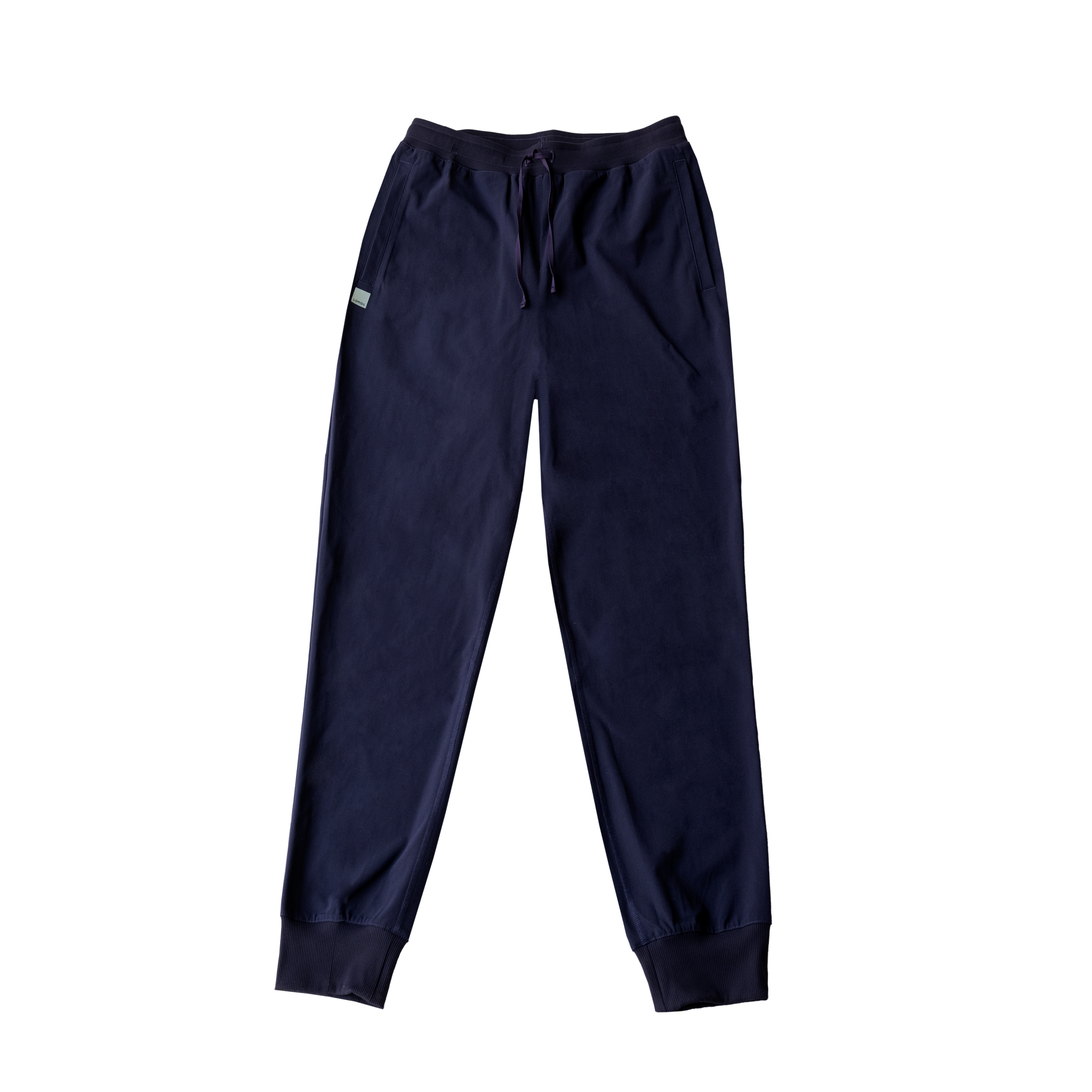 Navy HAVN WaveStopper™ Joggers with drawstring waist and ribbed cuffs, flat lay view on white background.