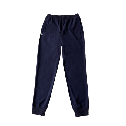 Navy HAVN WaveStopper™ Joggers with drawstring waist and ribbed cuffs, flat lay view on white background.