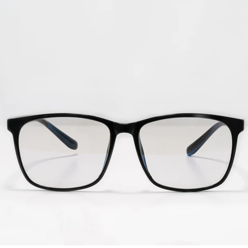 Black rectangular Ocushield Clear All-Day Blue Light Glasses with dark temples displayed front view against white background.