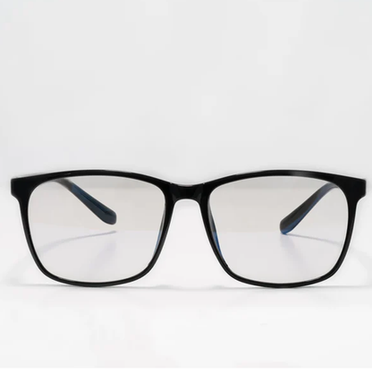 Black rectangular Ocushield Clear All-Day Blue Light Glasses with dark temples displayed front view against white background.