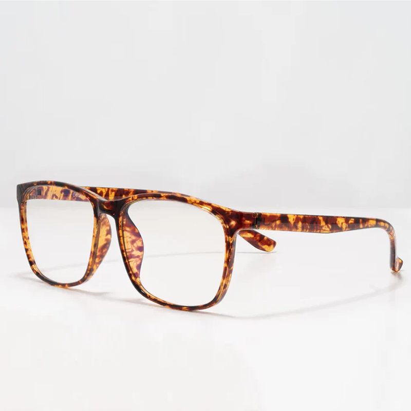 Ocushield Clear All-Day Blue Light Glasses in tortoiseshell pattern, front three-quarter view against white background.