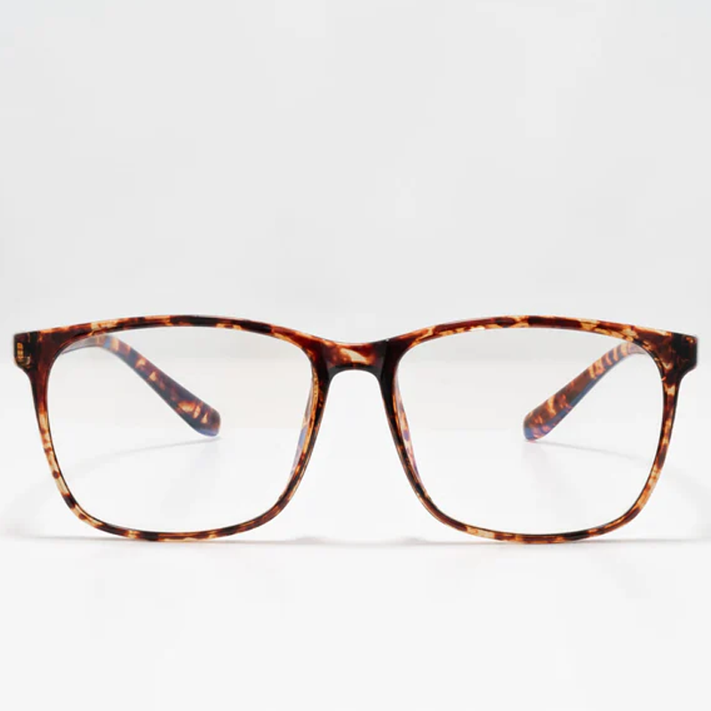 Ocushield Clear All-Day Blue Light Glasses in tortoiseshell brown, front view against white background.