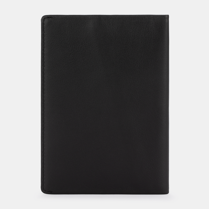 SLNT RFID Passport Wallet closed front view showing black leather exterior against white background.