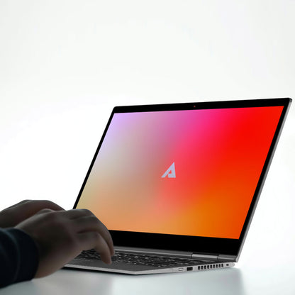 Hand using Above Privacy & Low EMF Laptop Bundle with colorful gradient display showing cursor icon.